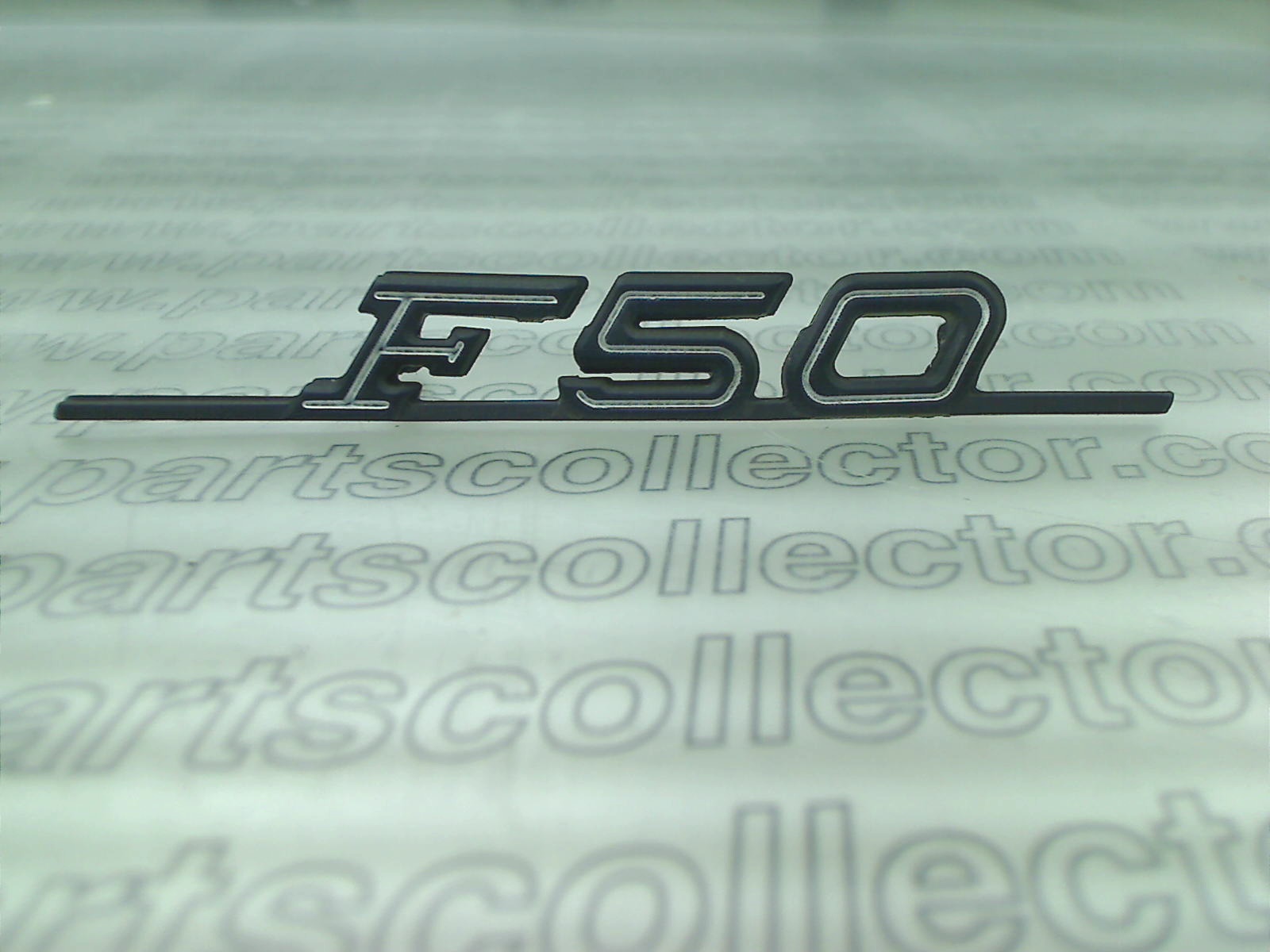 F50 EMBLEM